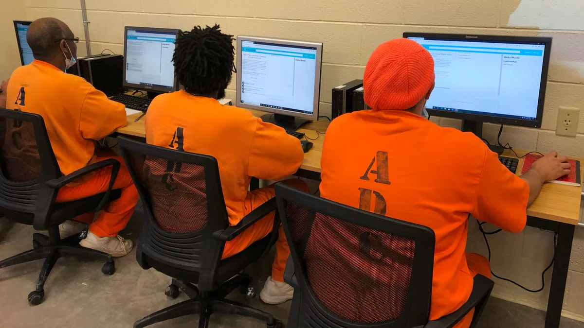 incarcerated individuals training on computers