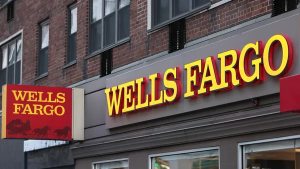 A Wells Fargo bank signage is seen on Broadway on December 20, 2022 in New York City.