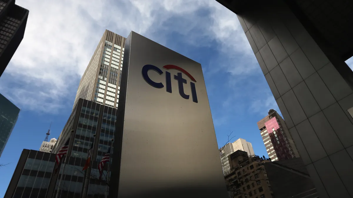 Outside shot of Citigroup HQ with a sign with the Citi logo in the shot
