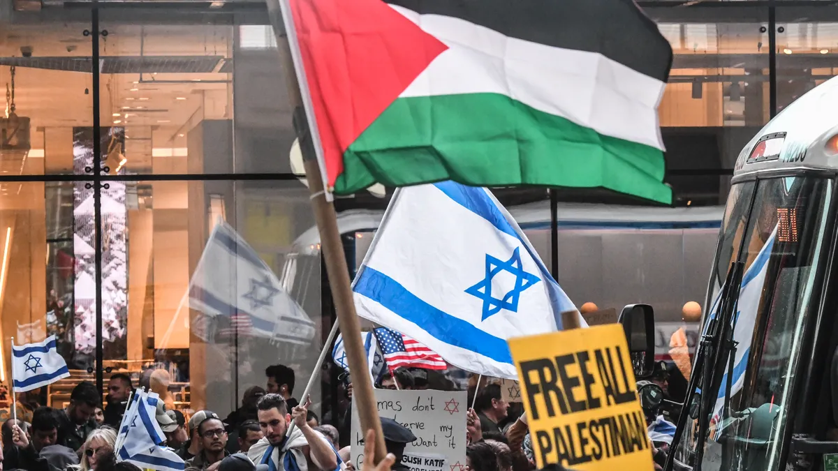 Pro-Israel activists counter demonstrate a Pro-Palestinian rally on October 13, 2023 in New York City.