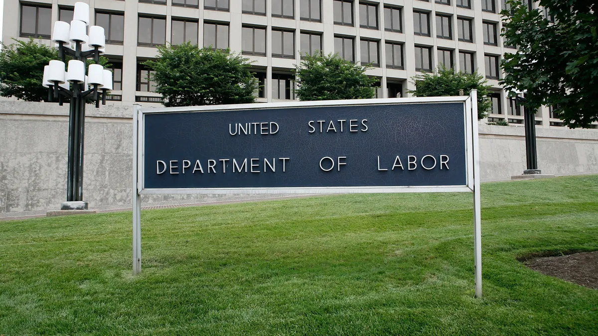 The exterior of the Labor Department building, with a sign that says "United States Department of Labor"