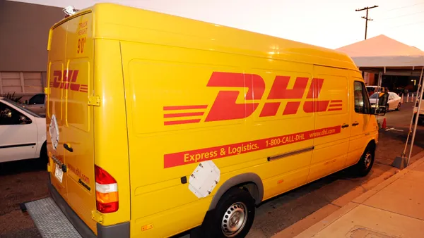 A DHL truck is posted outside of Mercedes Benz Fashion Week in Culver City, Calif. on October 12, 2008